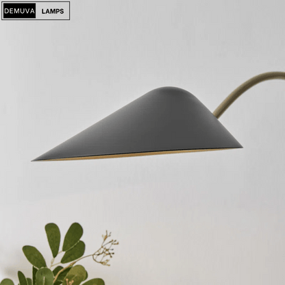 Elegant Wall Light - a sleek brushed metal reading lamp that embodies modern minimalism - Demuva
