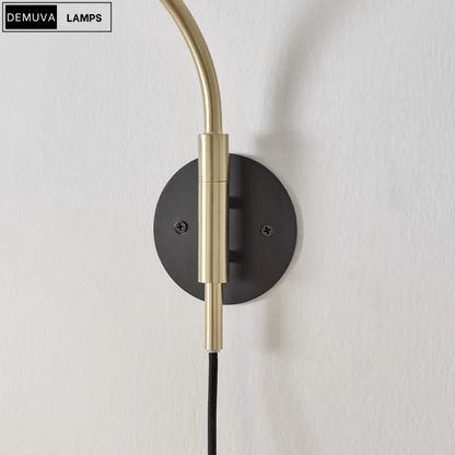 Elegant Wall Light - a sleek brushed metal reading lamp that embodies modern minimalism - Demuva