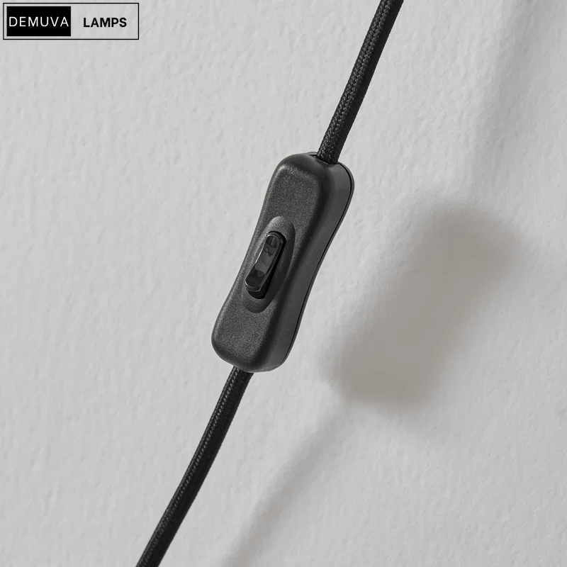 Elegant Wall Light - a sleek brushed metal reading lamp that embodies modern minimalism - Demuva