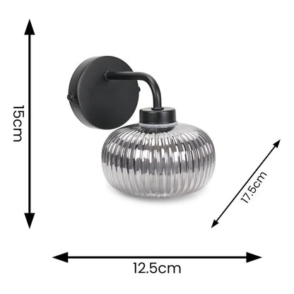 Glass Armed Sconce: Elevate Your Space with Elegant Lighting Design - Demuva