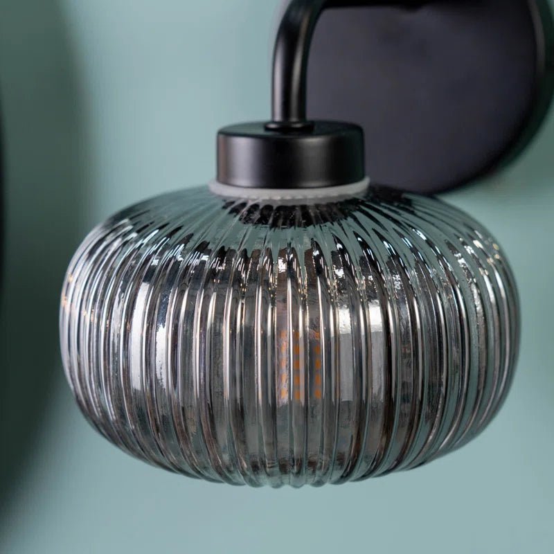 Glass Armed Sconce: Elevate Your Space with Elegant Lighting Design - Demuva