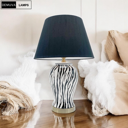 Illuminate your space with our stunning Modern Zebra Ceramic Table Lamp! 🦓✨ Perfect for your bedroom or hallway, this 64cm beauty features a chic drum black shade. #HomeDecor #LightingGoals