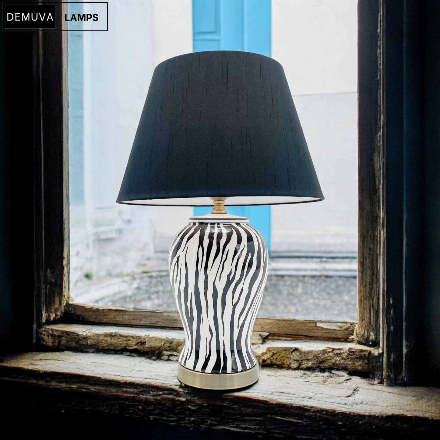 Illuminate your space with our stunning Modern Zebra Ceramic Table Lamp! 🦓✨ Perfect for your bedroom or hallway, this 64cm beauty features a chic drum black shade. #HomeDecor #LightingGoals
