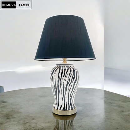 Illuminate your space with our stunning Modern Zebra Ceramic Table Lamp! 🦓✨ Perfect for your bedroom or hallway, this 64cm beauty features a chic drum black shade. #HomeDecor #LightingGoals